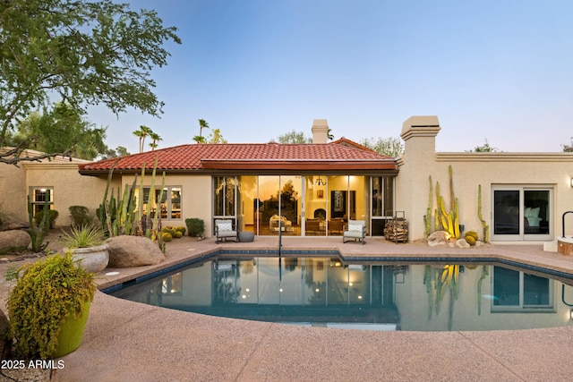 rear view of house with a patio area