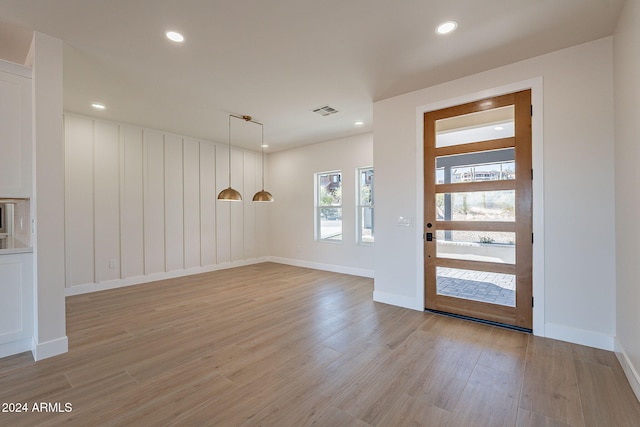 foyer with light hardwood / wood-style flooring