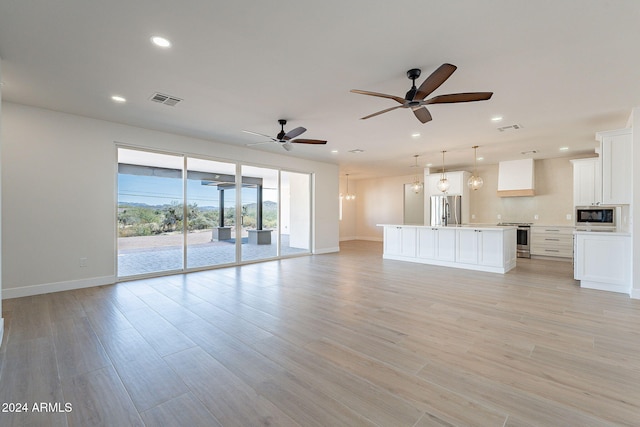 3877 S Veronica Ln, Gold Canyon, AZ 85118 - unfurnished living room featuring recessed lighting, ceiling fan, baseboards, and light wood-style floors
