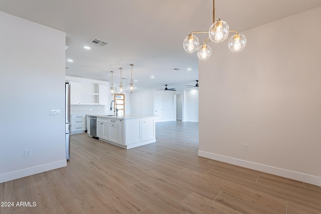 3877 S Veronica Ln, Gold Canyon, AZ 85118 - kitchen with open floor plan, open shelves, a ceiling fan, a sink, and white cabinets