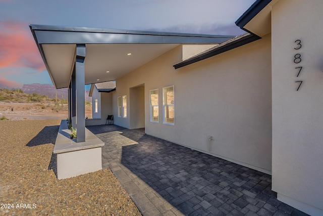 3877 S Veronica Ln, Gold Canyon, AZ 85118 - patio terrace at dusk featuring a patio