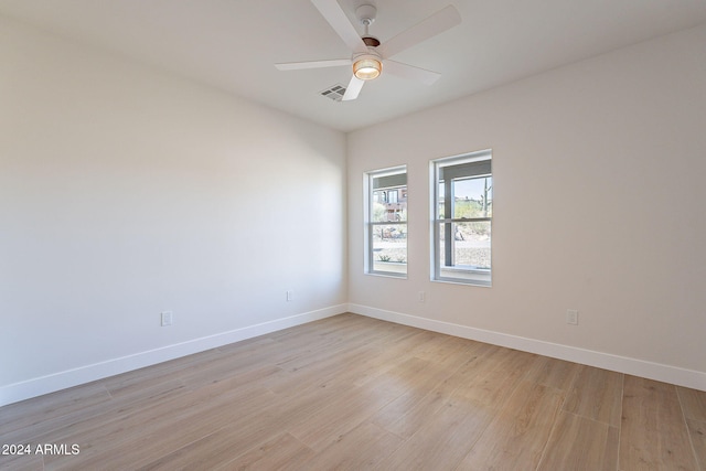 3877 S Veronica Ln, Gold Canyon, AZ 85118 - unfurnished room featuring light wood-type flooring, baseboards, and a ceiling fan