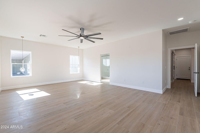 3877 S Veronica Ln, Gold Canyon, AZ 85118 - empty room with baseboards, light wood-style flooring, ceiling fan, and a smoke detector