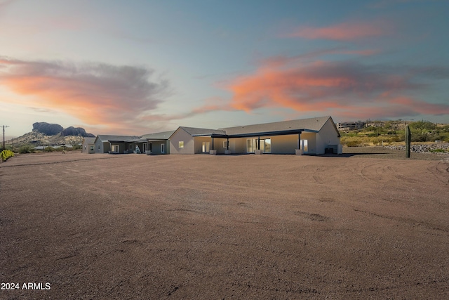 3877 S Veronica Ln, Gold Canyon, AZ 85118 - view of front of home with an attached garage and driveway