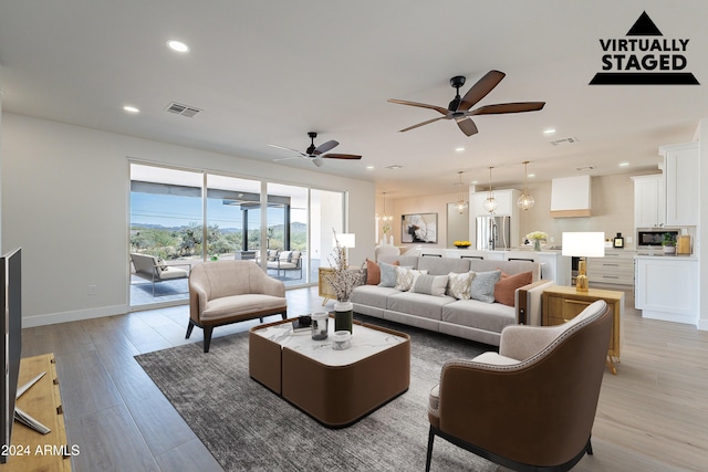 3877 S Veronica Ln, Gold Canyon, AZ 85118 - living area with recessed lighting, a ceiling fan, light wood-style floors, and baseboards
