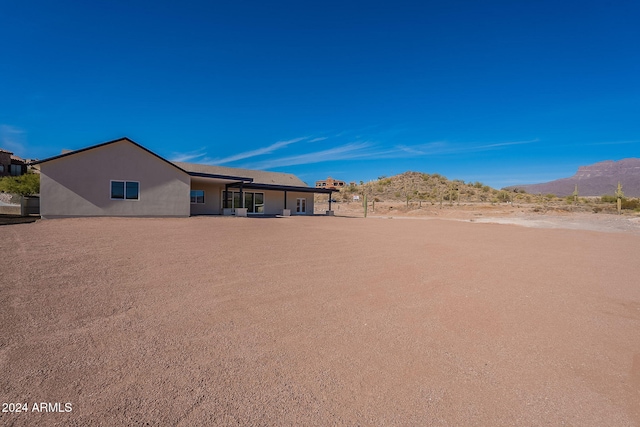 3877 S Veronica Ln, Gold Canyon, AZ 85118 - rear view of property featuring a mountain view