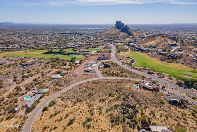 birds eye view of property featuring a mountain view