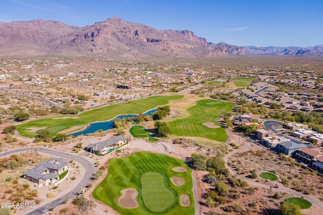 drone / aerial view featuring a water and mountain view