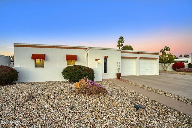 view of front of home with a garage