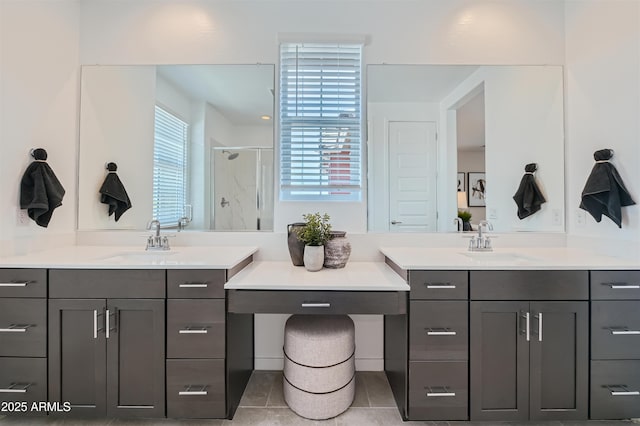 3340 S Lotus Ave, Mesa, AZ 85212 - bathroom with a shower stall, two vanities, and tile patterned flooring