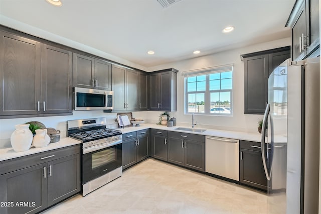 3340 S Lotus Ave, Mesa, AZ 85212 - kitchen with appliances with stainless steel finishes, light countertops, and recessed lighting