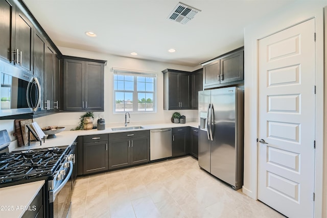 3340 S Lotus Ave, Mesa, AZ 85212 - kitchen with appliances with stainless steel finishes, light countertops, and recessed lighting