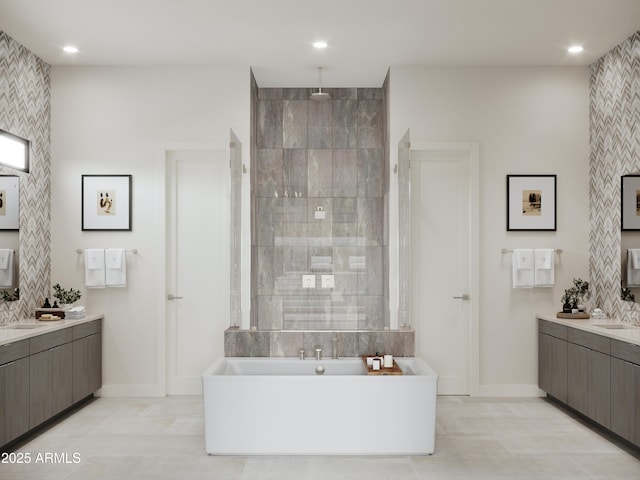 bathroom with a freestanding tub, baseboards, a walk in shower, and two vanities