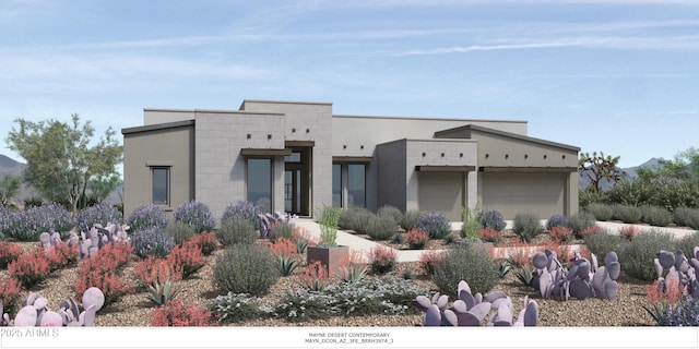 contemporary home featuring a garage and stucco siding