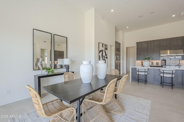 35065 N 83rd Pl Unit 4, Scottsdale, AZ 85266 - dining room featuring light tile patterned floors, baseboards, visible vents, a towering ceiling, and recessed lighting