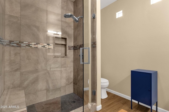 3221 N 37th St Unit 10, Phoenix, AZ 85018 - full bath with toilet, a stall shower, wood finished floors, and baseboards