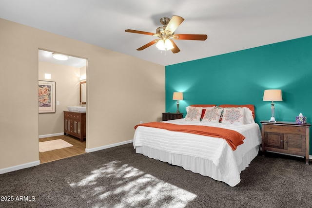 3221 N 37th St Unit 10, Phoenix, AZ 85018 - carpeted bedroom featuring baseboards, ceiling fan, and ensuite bath