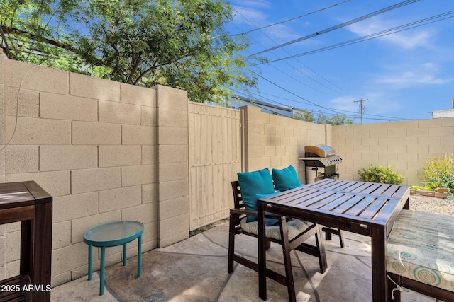 3221 N 37th St Unit 10, Phoenix, AZ 85018 - view of patio with grilling area and outdoor dining area