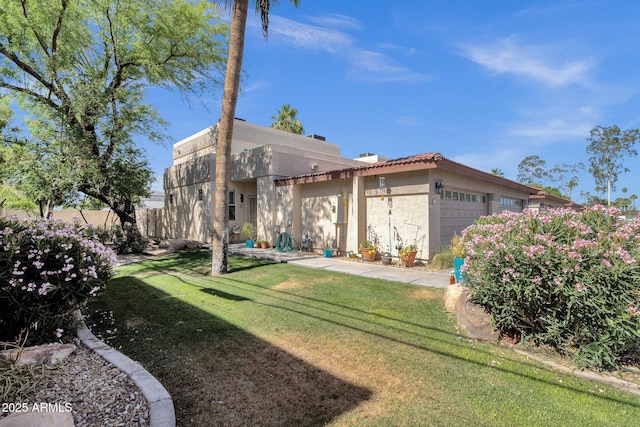 3221 N 37th St Unit 10, Phoenix, AZ 85018 - view of front of property featuring an attached garage, stucco siding, and a tile roof