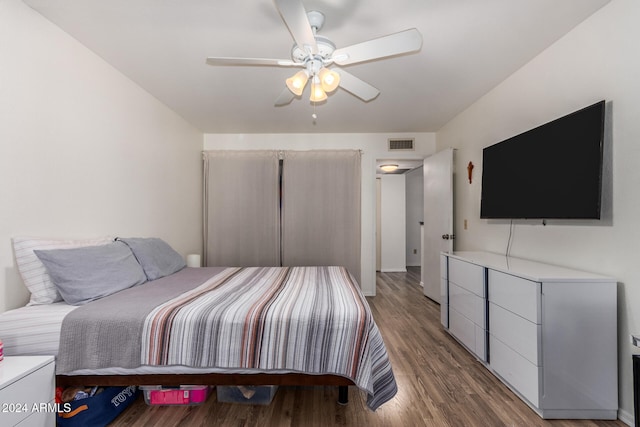 bedroom featuring ceiling fan and hardwood / wood-style flooring