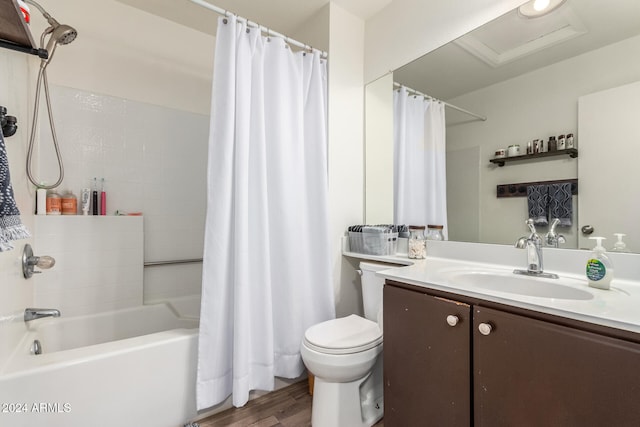 full bathroom with toilet, vanity, shower / tub combo, and hardwood / wood-style flooring