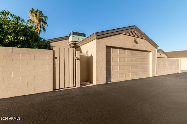 garage featuring central AC unit