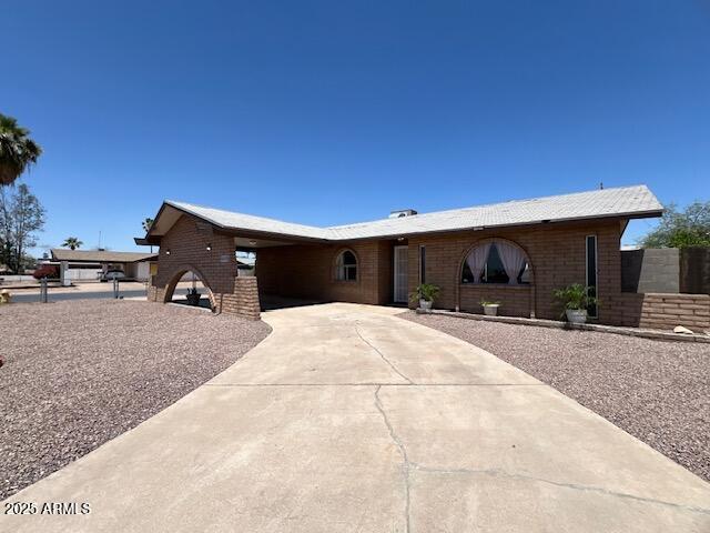 6430 W Thomas Rd, Phoenix, AZ 85033 - single story home with driveway and brick siding