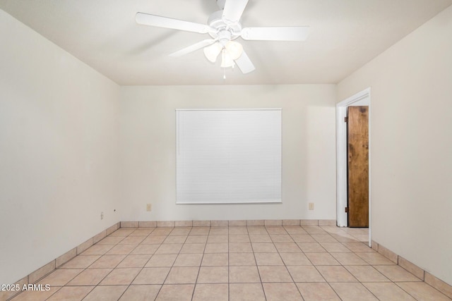 6430 W Thomas Rd, Phoenix, AZ 85033 - empty room featuring ceiling fan, light tile patterned floors, and baseboards