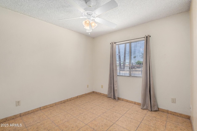 6430 W Thomas Rd, Phoenix, AZ 85033 - unfurnished room featuring a ceiling fan, a textured ceiling, baseboards, and light tile patterned flooring