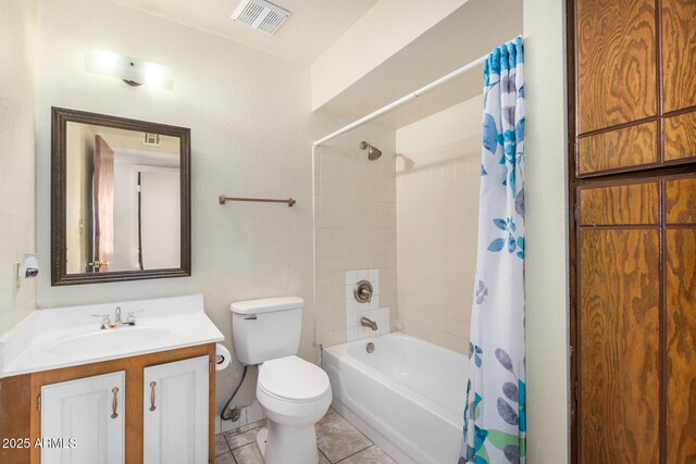 6430 W Thomas Rd, Phoenix, AZ 85033 - bathroom featuring vanity, toilet, tile patterned flooring, and shower / bath combo with shower curtain