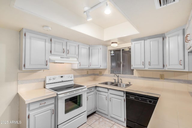 6430 W Thomas Rd, Phoenix, AZ 85033 - kitchen featuring white range with electric stovetop, under cabinet range hood, dishwasher, a sink, and light tile patterned flooring