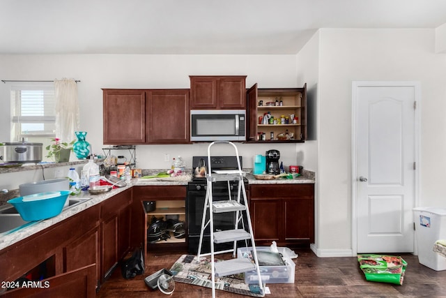 kitchen with black / electric stove and dark hardwood / wood-style floors