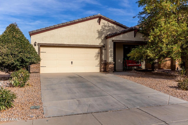 view of front of home with a garage