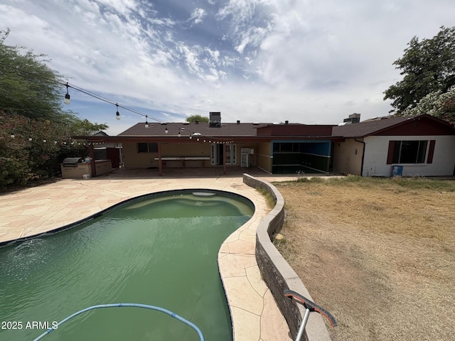 5542 W Monte Cristo Ave, Glendale, AZ 85306 - outdoor pool featuring a patio area