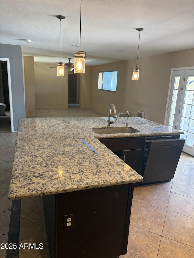 5542 W Monte Cristo Ave, Glendale, AZ 85306 - kitchen featuring a sink, black dishwasher, light tile patterned floors, and light stone counters