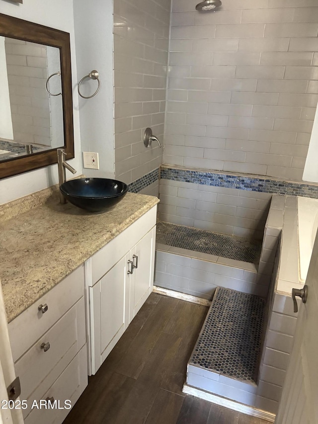 5542 W Monte Cristo Ave, Glendale, AZ 85306 - full bath featuring vanity, wood finished floors, and tiled shower