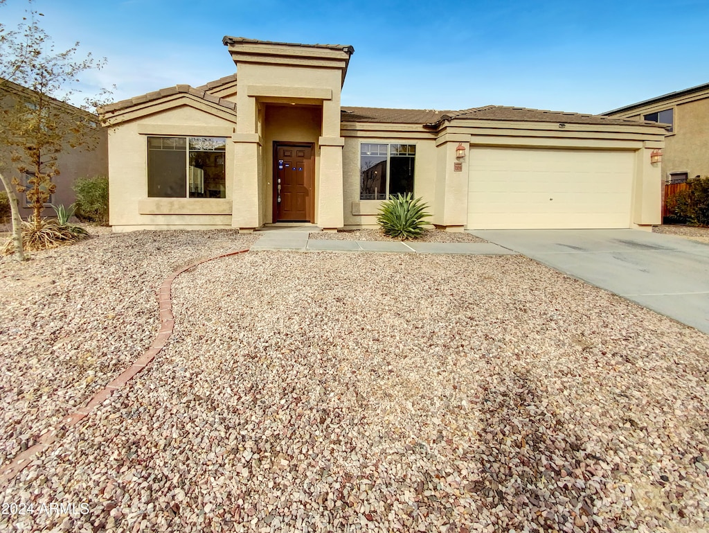 view of front of property with a garage