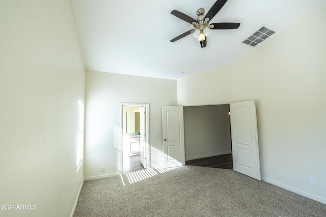 unfurnished bedroom featuring dark carpet and ceiling fan