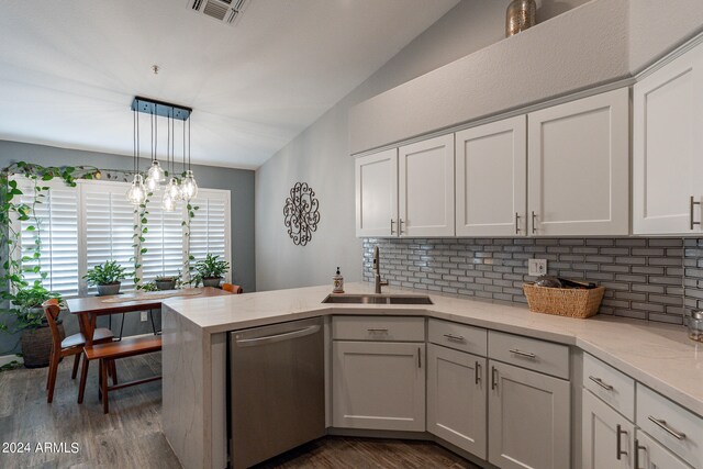 kitchen with dark hardwood / wood-style floors, sink, dishwasher, hanging light fixtures, and white cabinetry