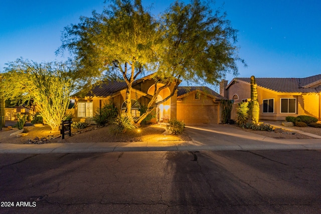 view of front of home with a garage