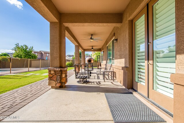 view of patio with ceiling fan