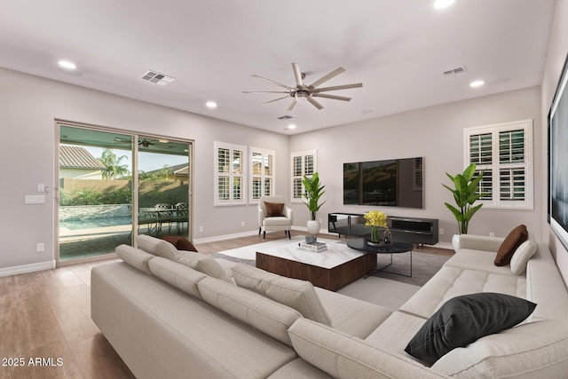 2027 E Ln Costa Ct, Gilbert, AZ 85298 - living area with recessed lighting, ceiling fan, wood finished floors, and baseboards