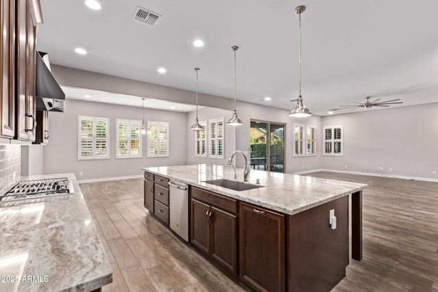 2027 E Ln Costa Ct, Gilbert, AZ 85298 - kitchen with a sink, wall chimney exhaust hood, appliances with stainless steel finishes, recessed lighting, and a ceiling fan