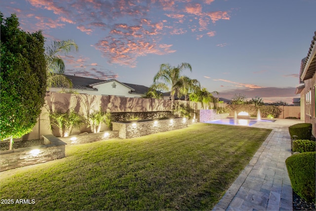 2027 E Ln Costa Ct, Gilbert, AZ 85298 - yard at dusk featuring a patio