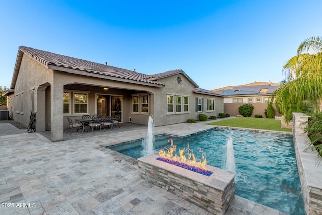 2027 E Ln Costa Ct, Gilbert, AZ 85298 - rear view of property with a tiled roof, stucco siding, an outdoor fire pit, and a patio