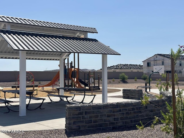 view of patio featuring a playground