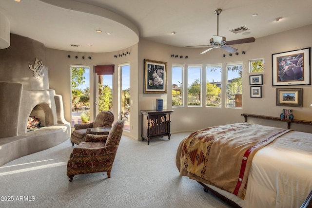 bedroom with carpet floors, access to outside, recessed lighting, and baseboards