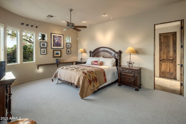carpeted bedroom with baseboards