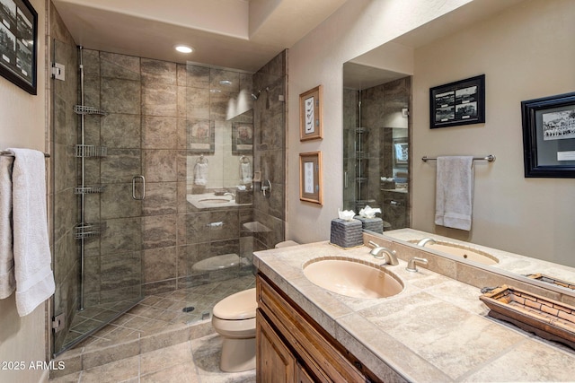 full bathroom featuring toilet, a shower stall, vanity, recessed lighting, and tile patterned floors
