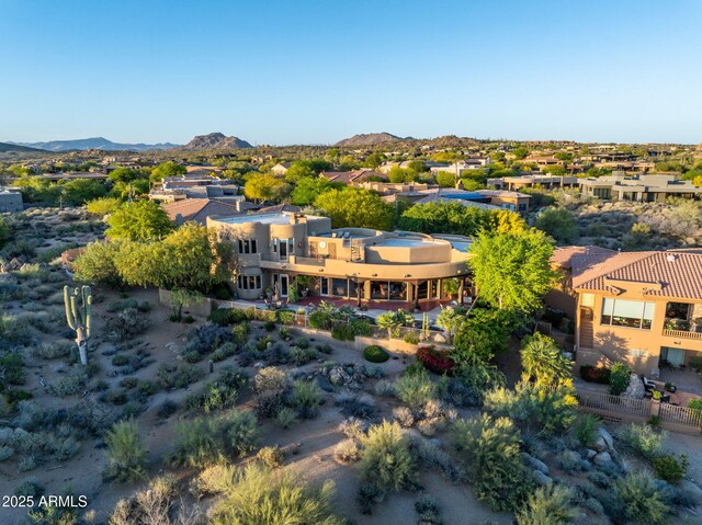 aerial view of residential area with a mountain backdrop
